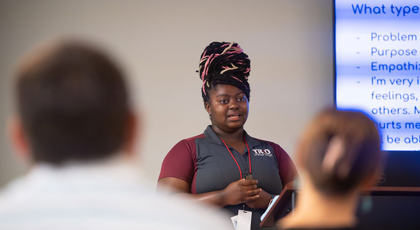 High School Student doing presentation in Summer College program