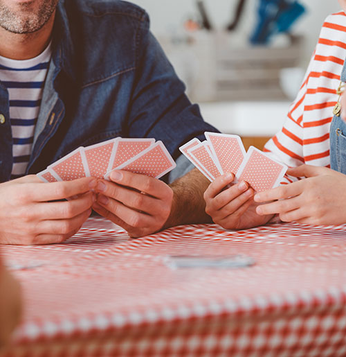 Two dance students learning salsa move in dance class
