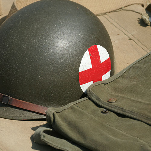 Helmet with red cross symbol