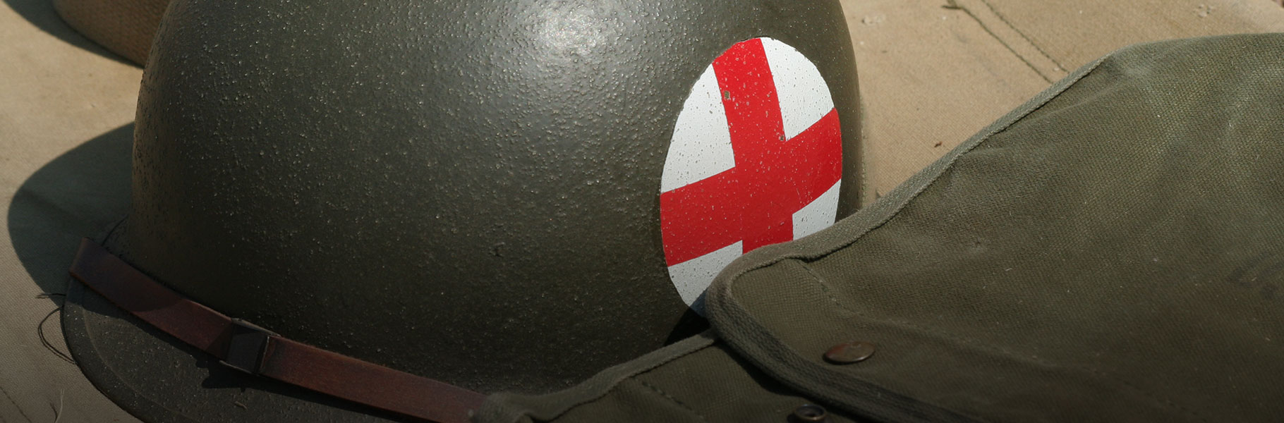 military helmet with red cross insignia
