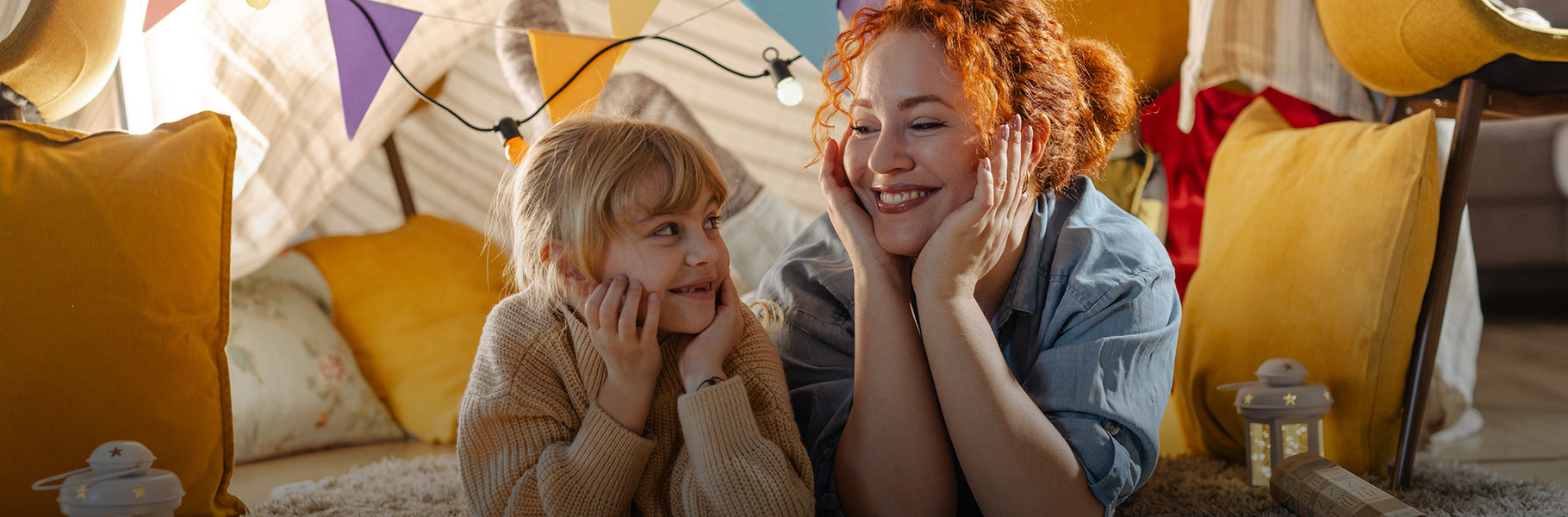 babysitter and child smiling
