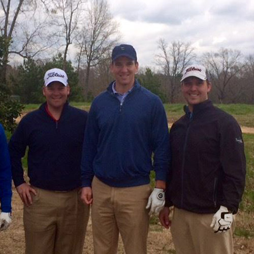 MBA Golf Classic players with Eli Manning