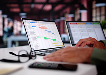 laptop screen displaying project management software