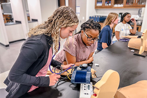 Student working in lab with advance equipment