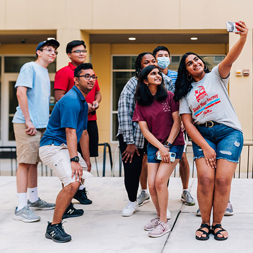 Group of EdStart students taking selfie on campus