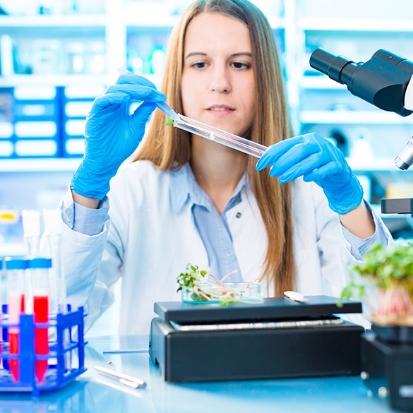 Female student conducting chemistry experiment