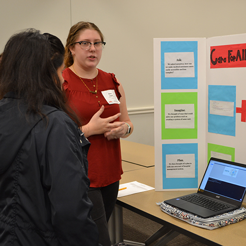 MSEF State Science Fair participant with their display and judge