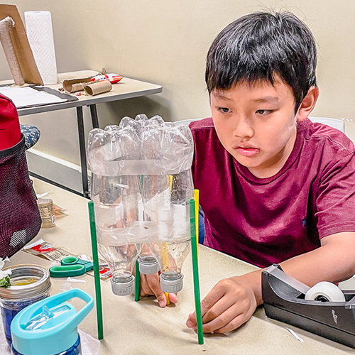 Rebel Quest student working on water project