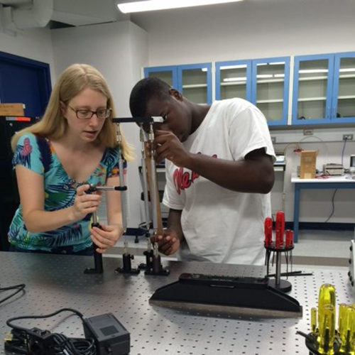 Female student conducting chemistry experiment