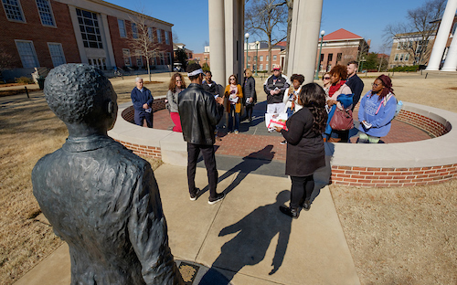 Studentat the Open Doors memorial on the Ole Miss Campus