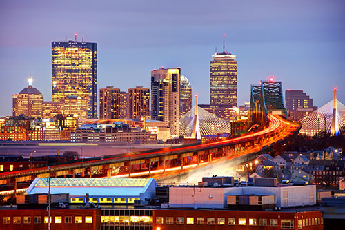Boston Skyline at sunset with city lights