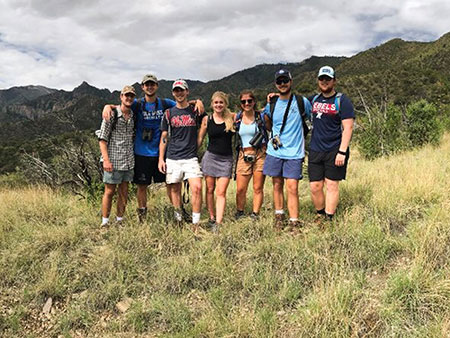 Students posing for photo before beginning field work course