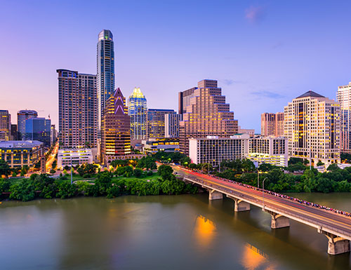 Austin, Texas, USA downtown skyline over the Colorado River.