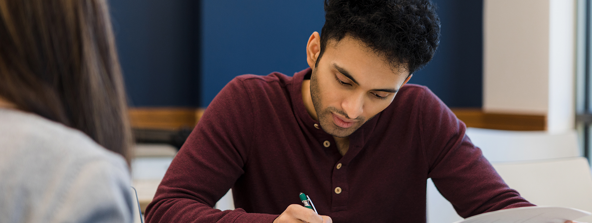 Student concentrating on test