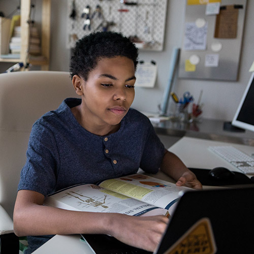 student working on computer